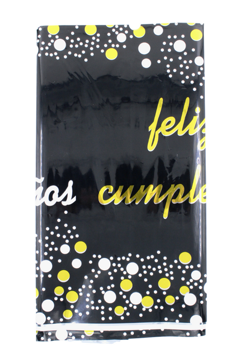 Mantel para celebraciones con feliz cumpleaños y diseño de lunares en diferentes colores