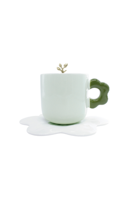 Taza de cerámica con plato y asa en forma de flor en colores varios ideal para café o té