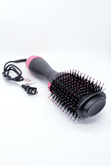 Peine de aire caliente para cabello en color negro con rosa.