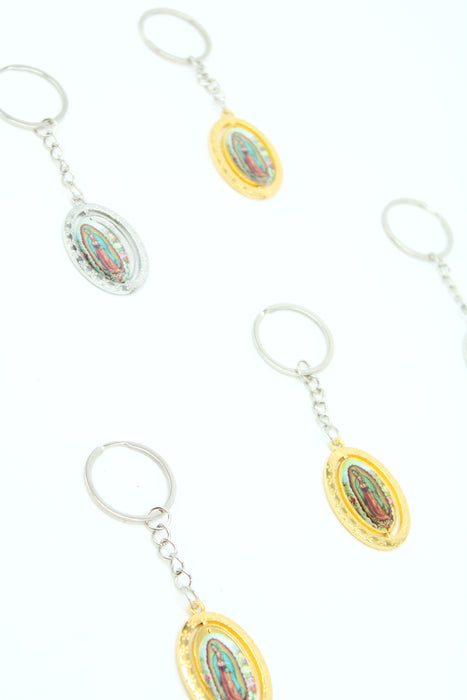 Paquete de llaveros giratorios en color dorado y plateado con imagen de La Virgen de Guadalupe, 12 piezas