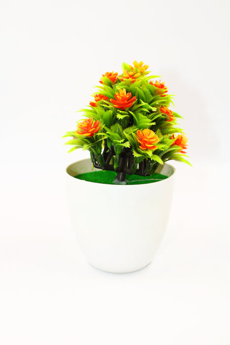 Planta artificial con maceta disponible en colores varios diseño del mundo de las flores