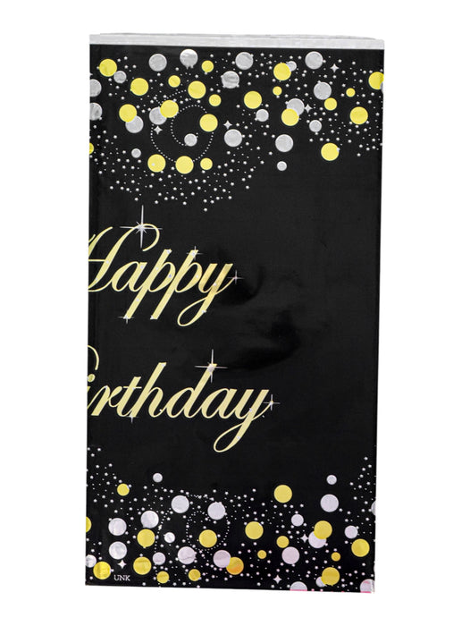 Mantel para fiesta con puntos y leyenda happy birthday en colores varios