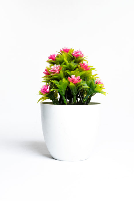 Planta artificial con maceta disponible en colores varios diseño del mundo de las flores