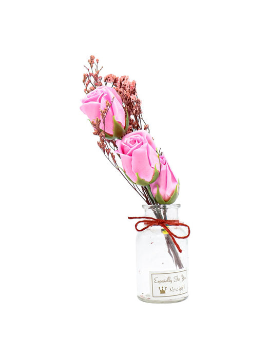 Caja con tres flores de rosa artificial en colores varios con frasco de vidrio para obsequio