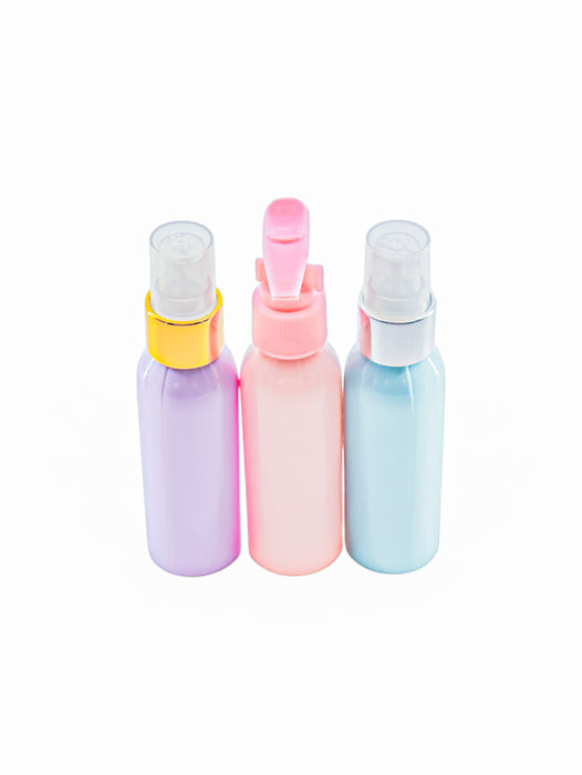 Kit de tres botellas de plastico con dispensadores varios para viajes en colores pastel