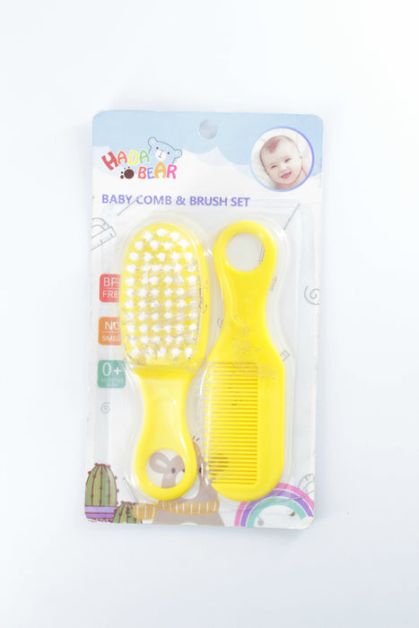 Paquete de peine y cepillo para bebe color amarillo.