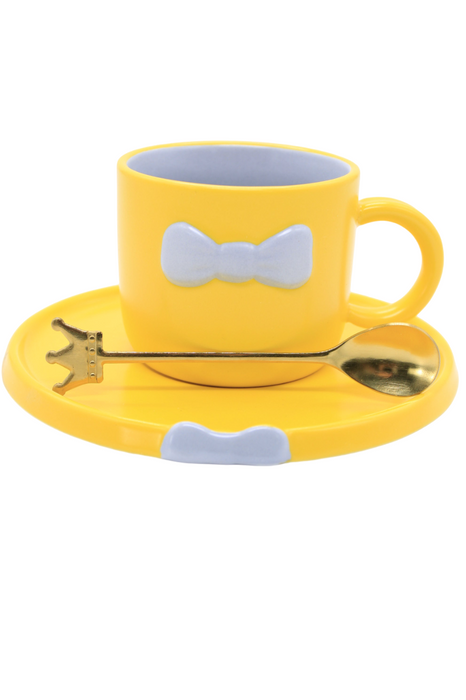 Taza de cerámica con plato y cuchara en colores varios para café o té diseño moño elegante