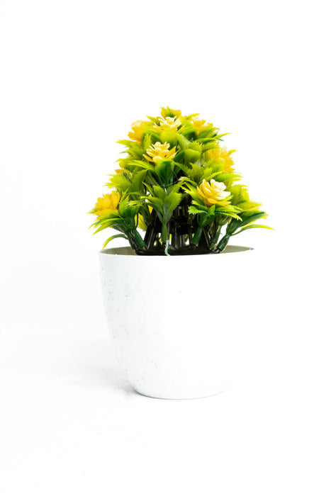 Planta artificial con maceta disponible en colores varios diseño del mundo de las flores