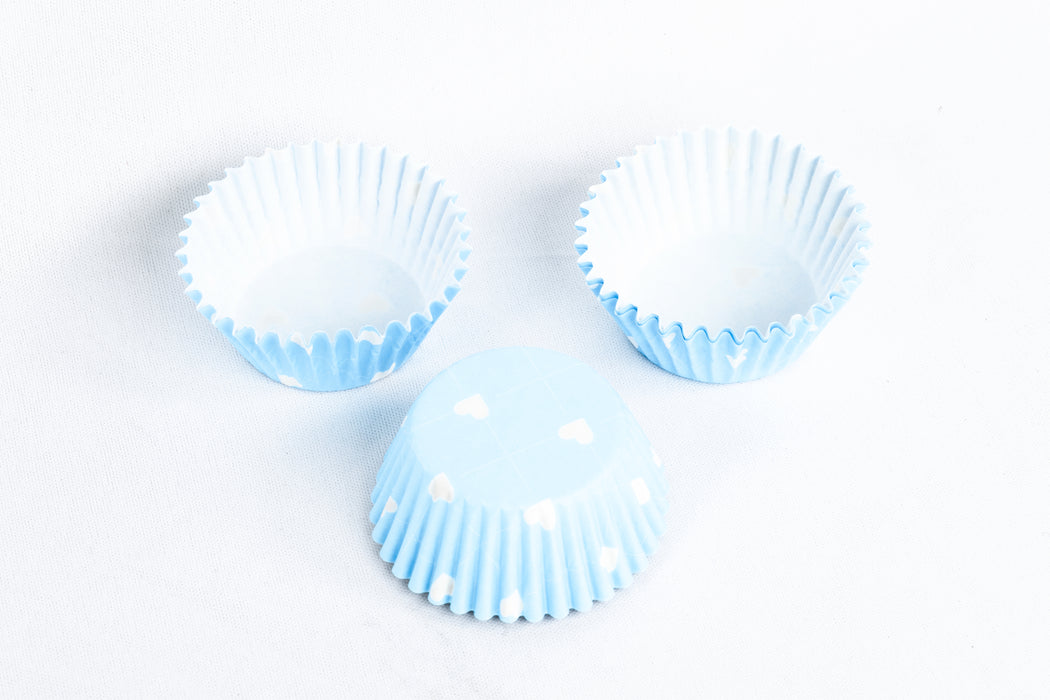 Paquete de capacillos de papel para hornear cupcakes color azul o naranja con diseño de corazones