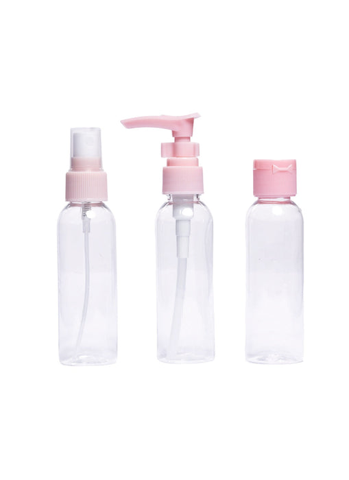 Kit de botellas y tarros de plastico para viaje color rosa ideal para productos de cuidado personal