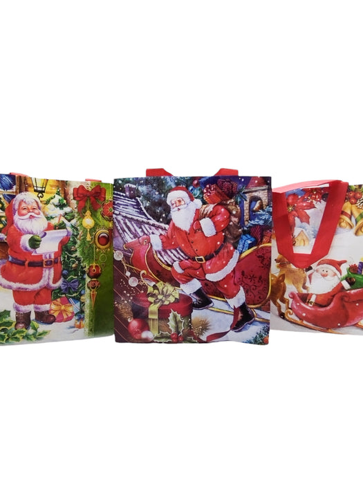 Paquete de bolsas ecológicas tamaño chico con diseños de Santa claus y asas rojas